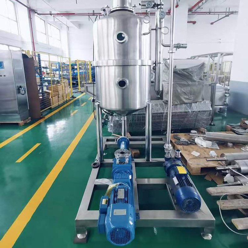 Vacuum degasser workshop featuring skilled technicians and advanced machinery for manufacturing vacuum degassing systems